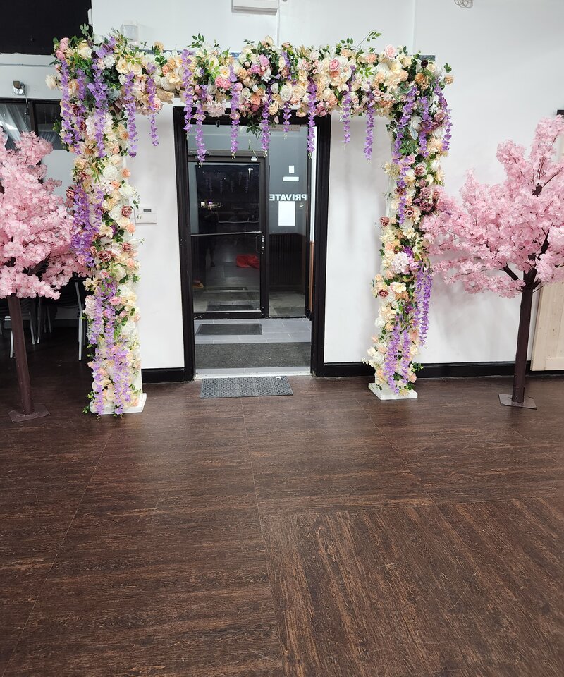 Lavender pink floral arch with cherry blossom trees bridal shower decoration Columbus Ohio