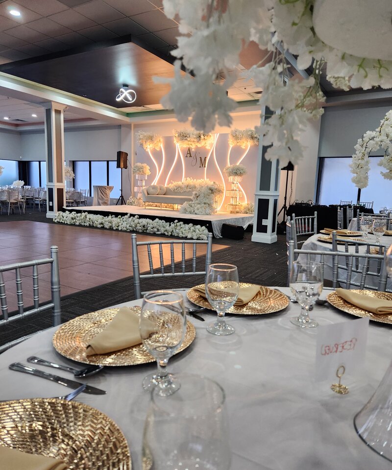 White and gold wedding reception stage LED lights cherry blossom centerpieces Ohio