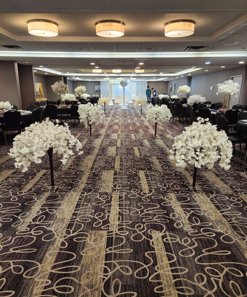 Black and white wedding ceremony with cherry blossom aisle and floral arch Columbus Ohio